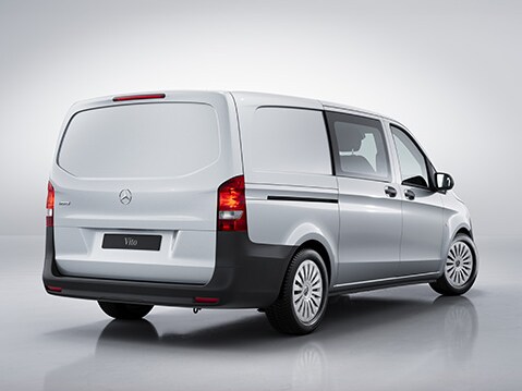 The sliding door on the left-hand side offers additional access to the vehicle.