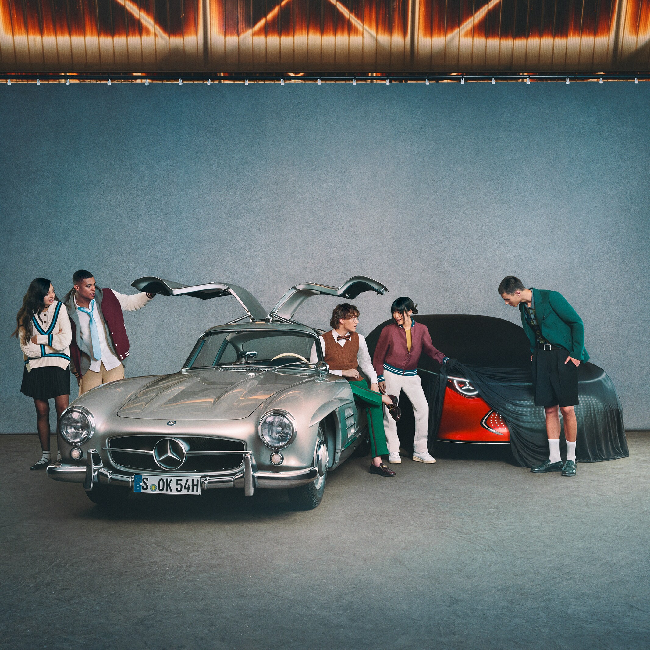 A front view of several Mercedes-Benz vehicles.