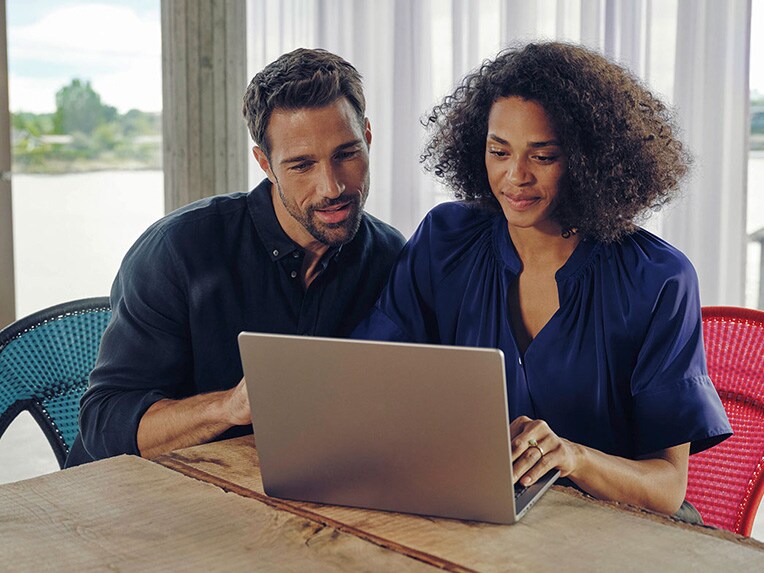 A woman and a man inquire about financing offers.