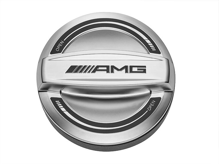 A section of the exterior with a focus on the AMG fuel filler cap.