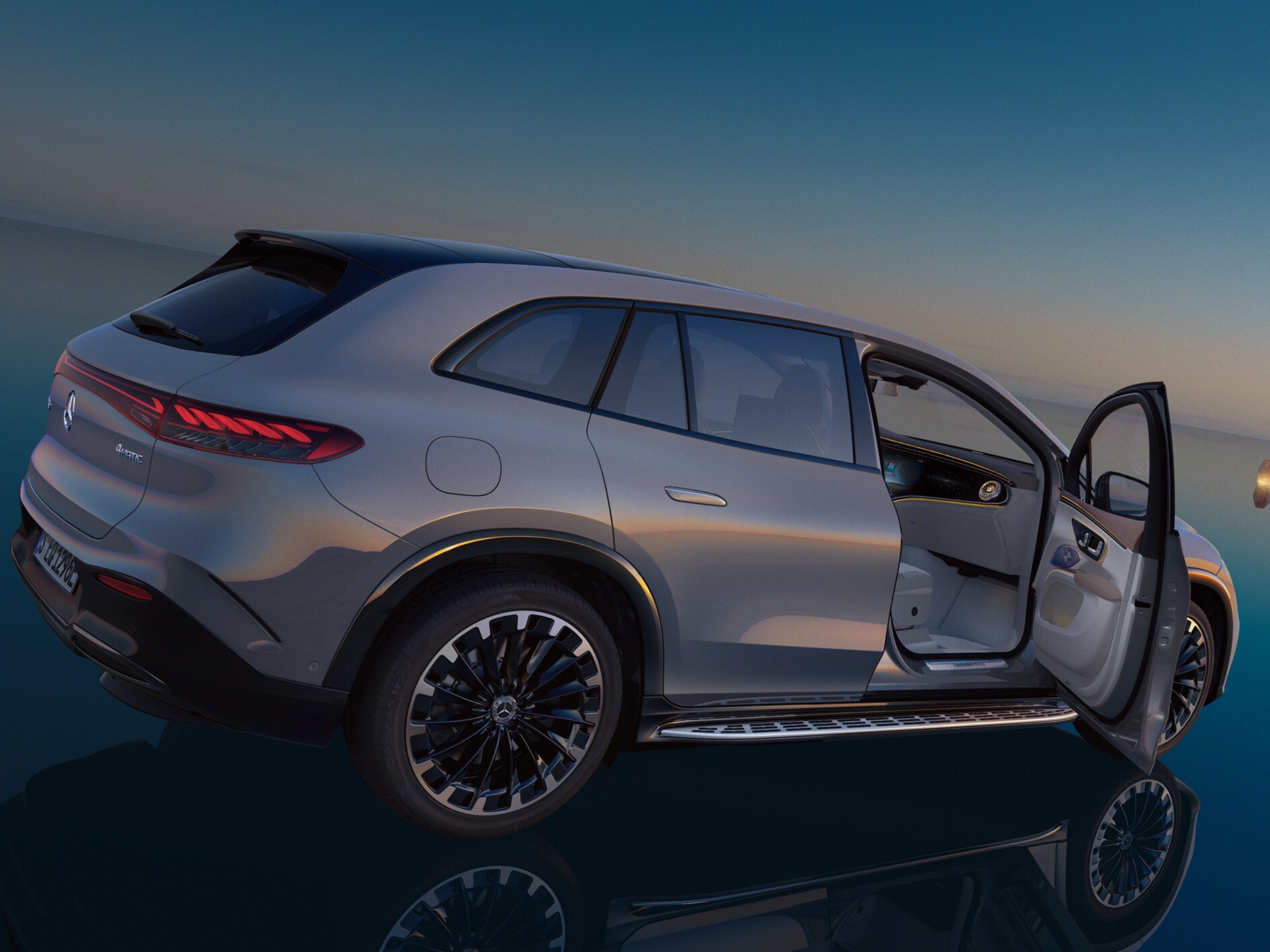 The EQS SUV from a side rear perspective.