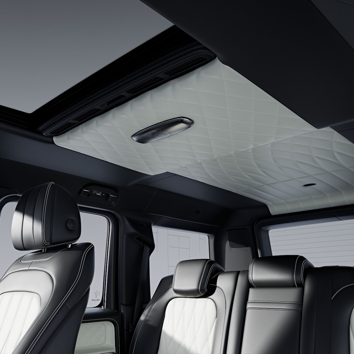 Side view through the open passenger door to the front seats with MANUFAKTUR Full Leather Package.