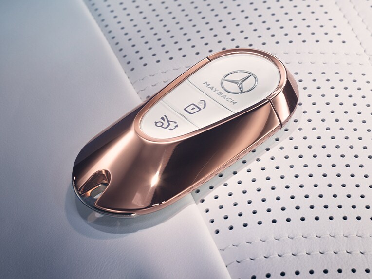 A Mercedes-Maybach vehicle key in rose gold.