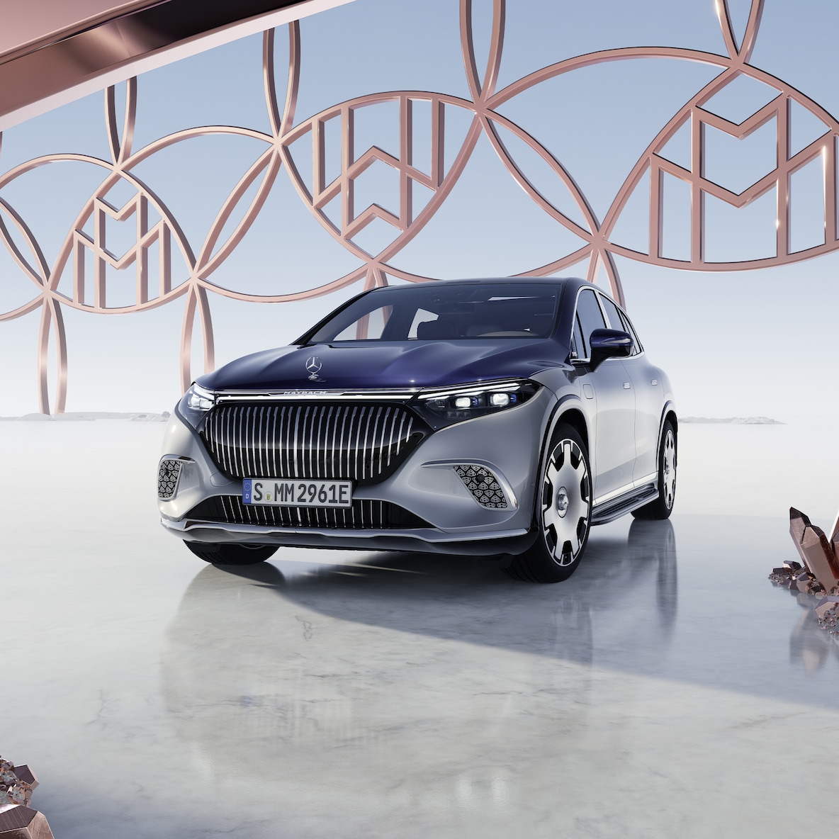 The Mercedes-Maybach EQS SUV in Maybach two-tone paint finish seen from the front.