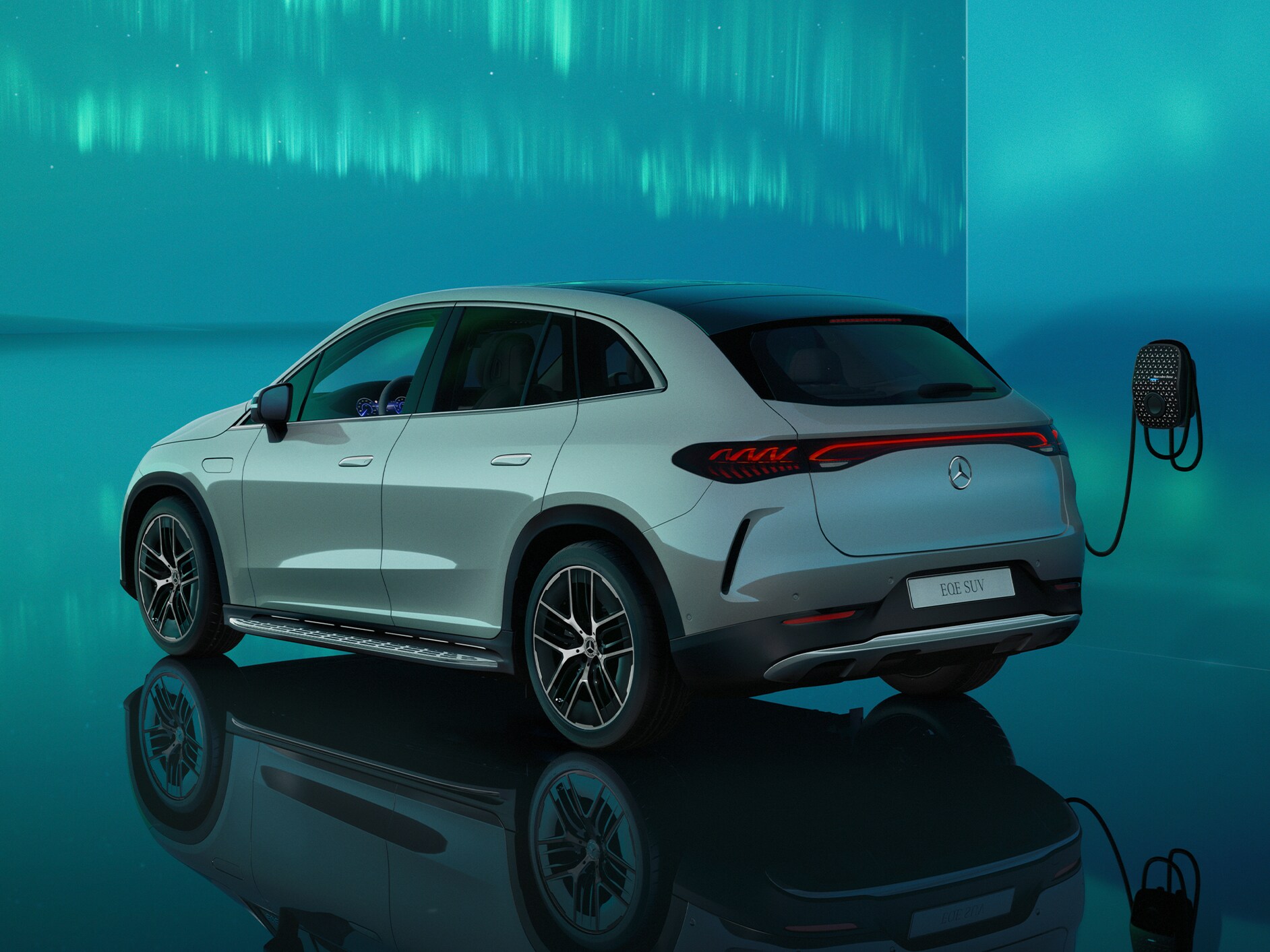 The photo shows a rear view of the EQE from Mercedes-EQ.