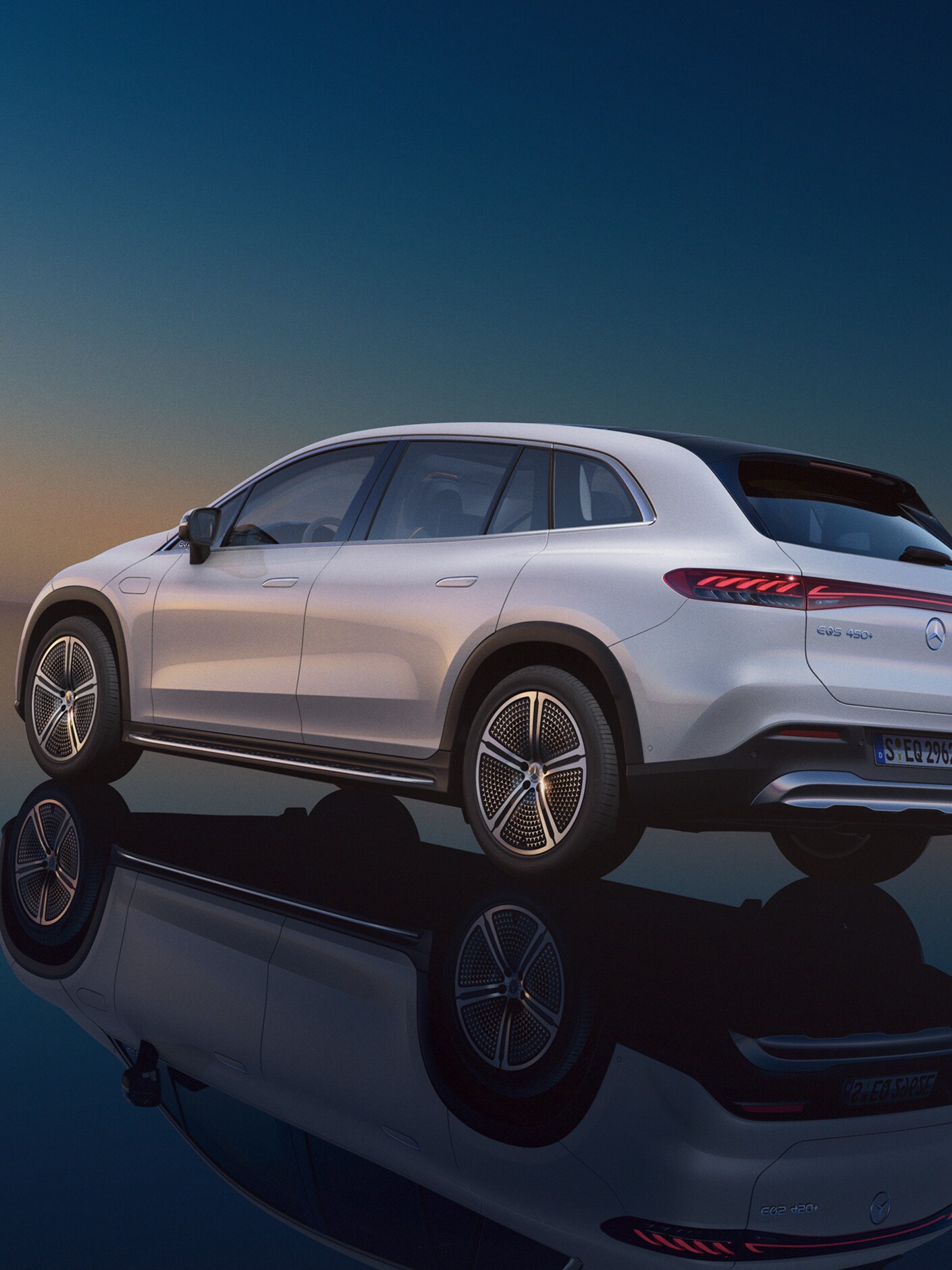 The photo shows a side view of the EQS SUV from Mercedes-EQ.