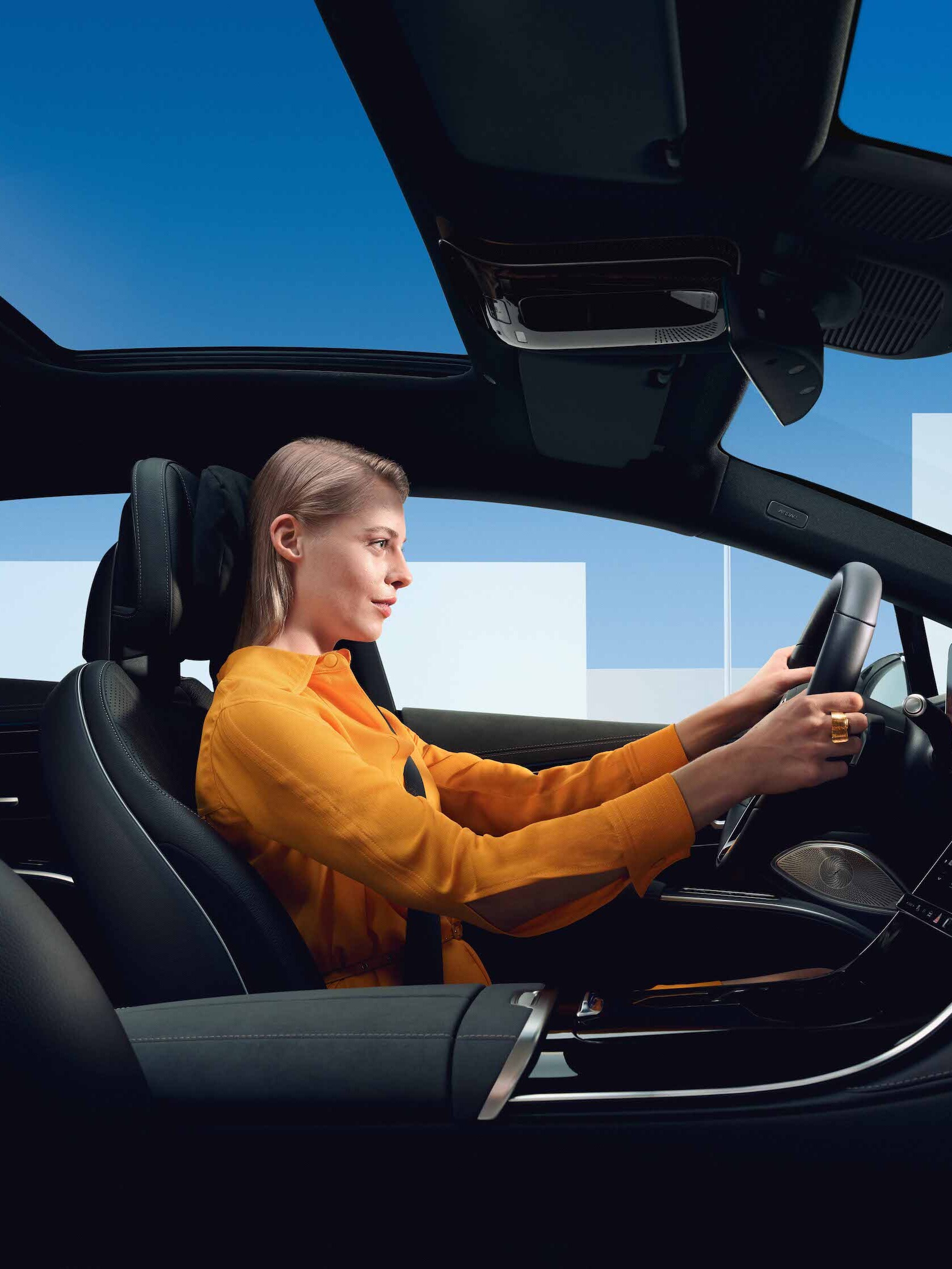 The photo shows a man speaking on the phone leaving an airport.