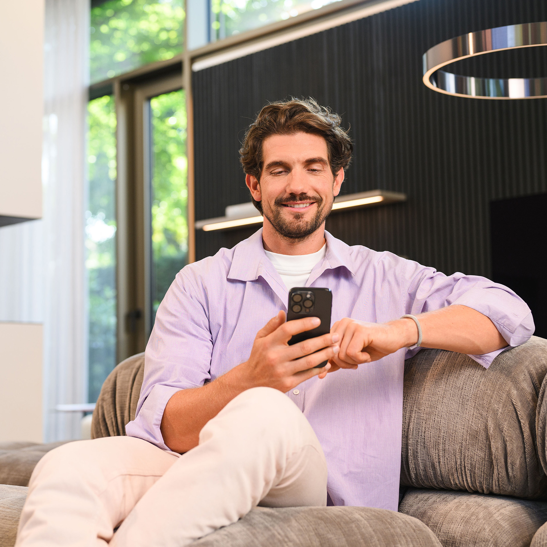 Mercedes-Benz Rent for your Mercedes-Benz A person sitting and using a mobile device.