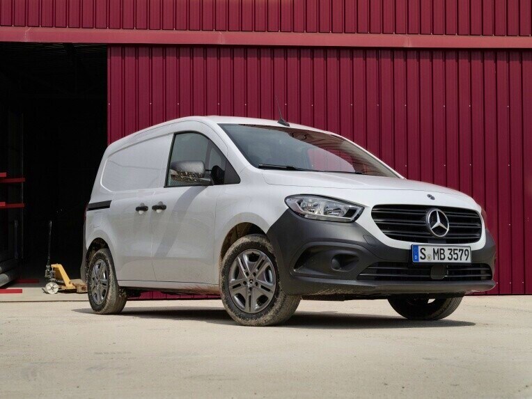 A Citan panel van from Mercedes-Benz, a small van with a high loading capacity, parked on an industrial site.